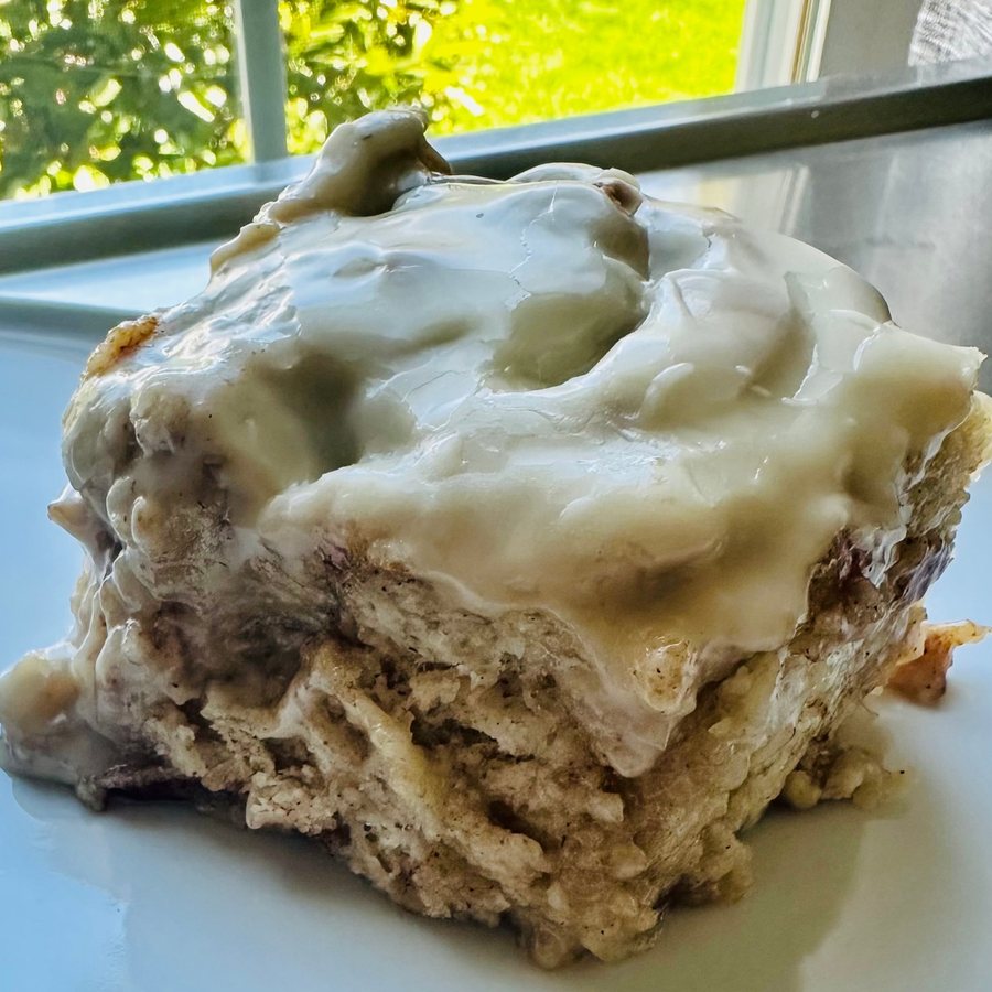 Gluten-free dairy-free cinnamon roll with maple glaze